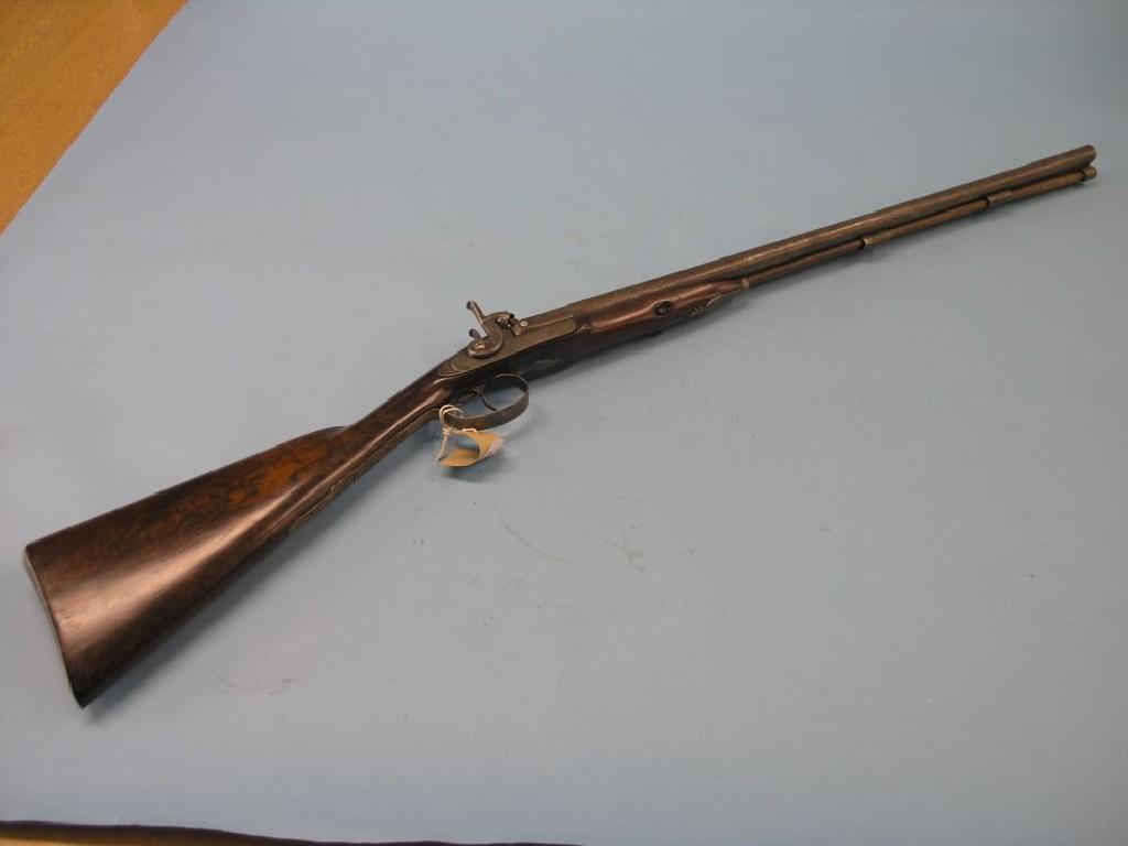 Appraisal: A Victorian percussion shotgun signed Dooley double-barrel walnut stock with