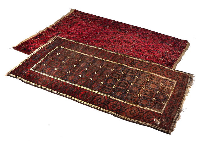 Appraisal: AN AFGHAN WINE GROUND RUG with a repeating bird like