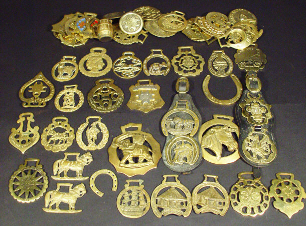 Appraisal: Collection of horse brasses mainly modern some on leather straps