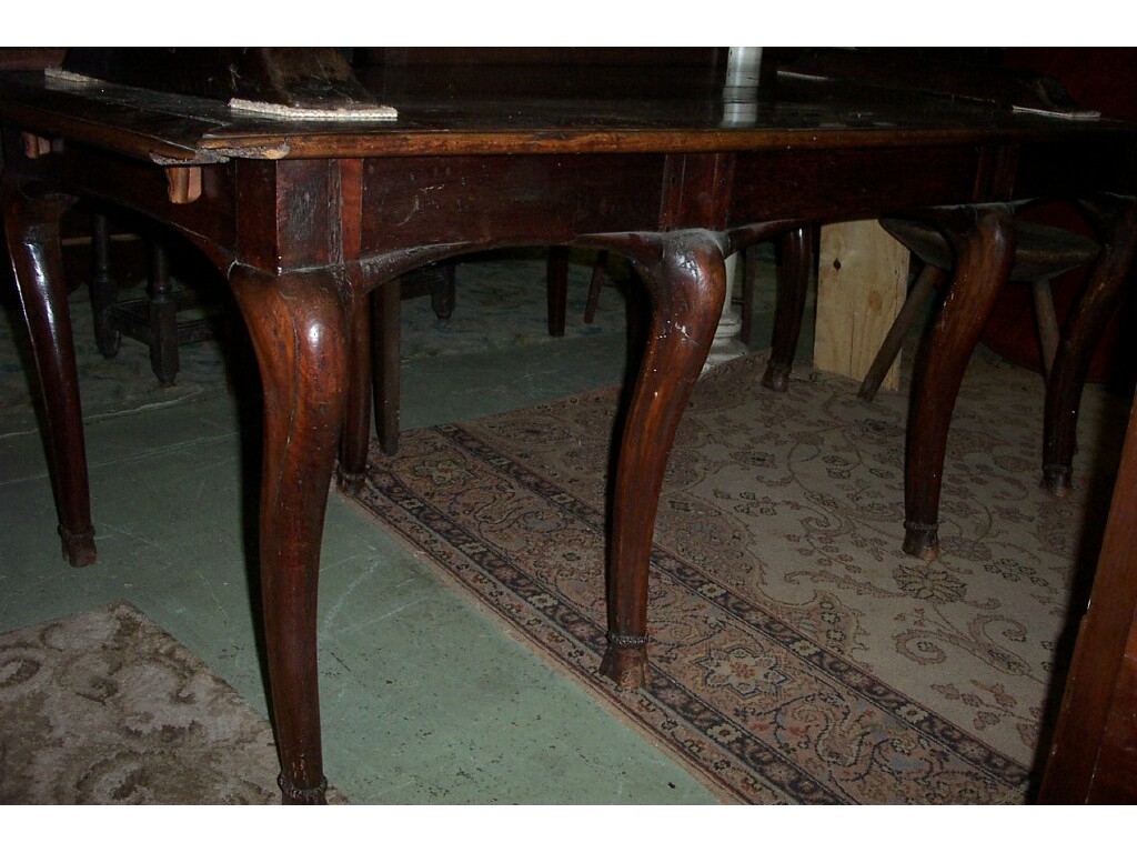 Appraisal: An oak and walnut centre table of rectangular form the