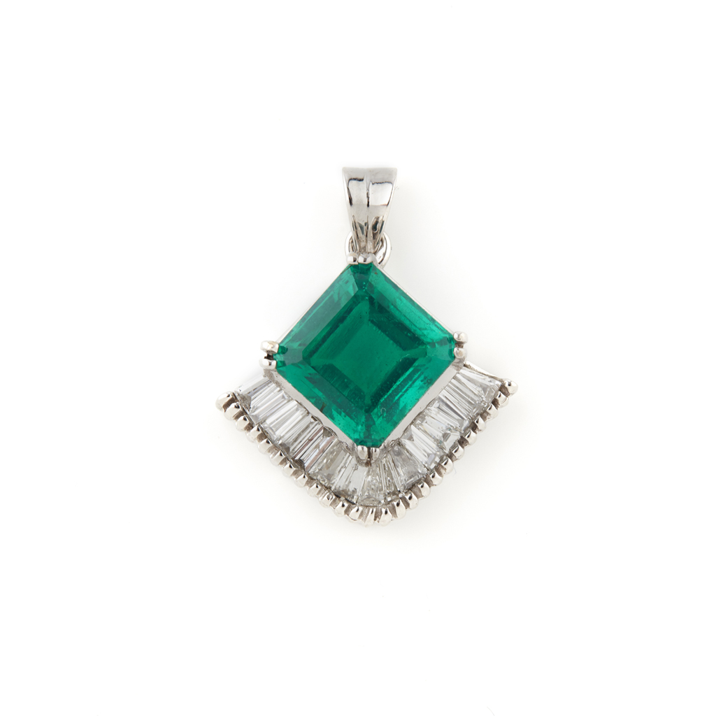 Appraisal: An emerald doublet and diamond set pendant claw set with