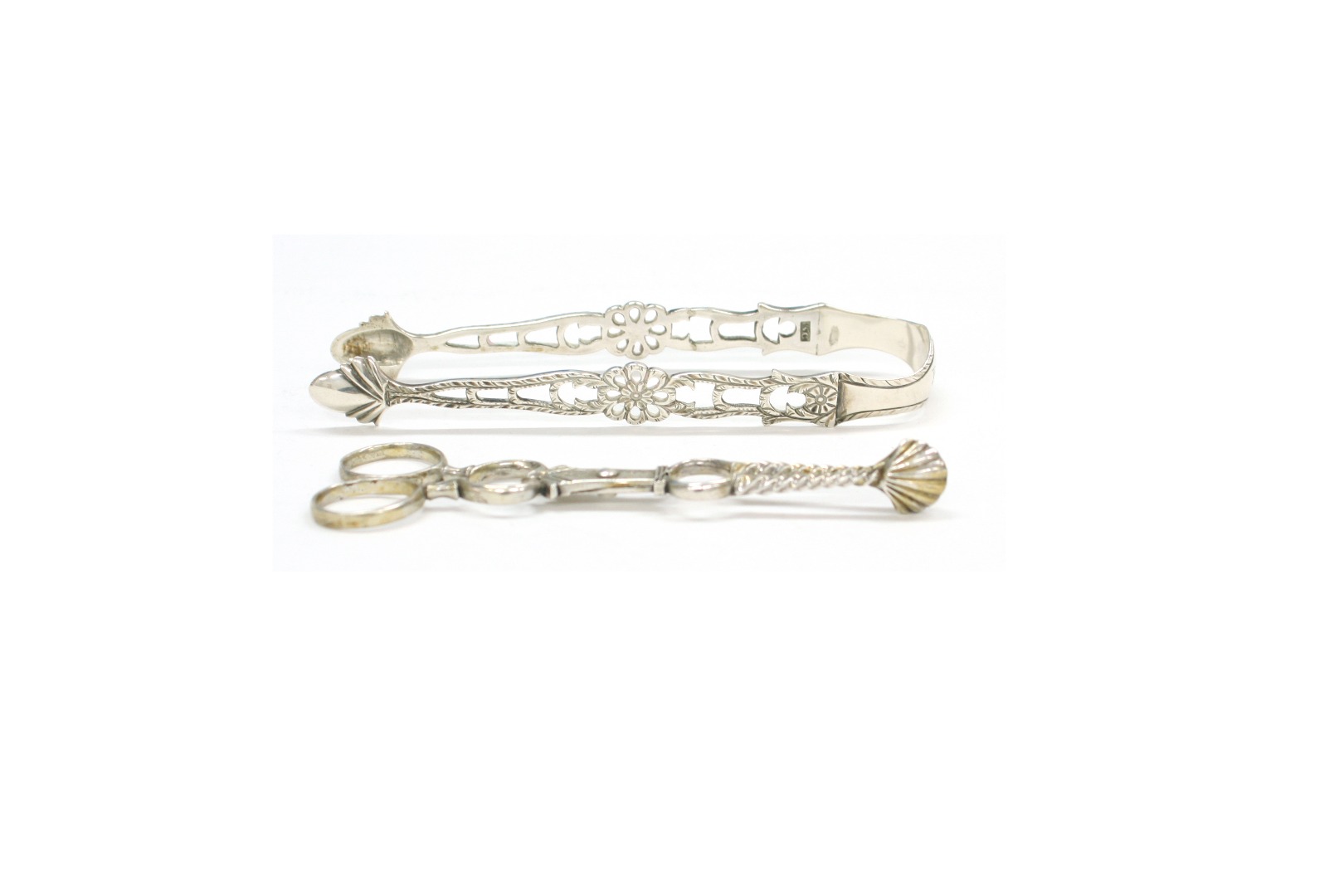 Appraisal: A pair of George III silver sugar tongs William Cattell