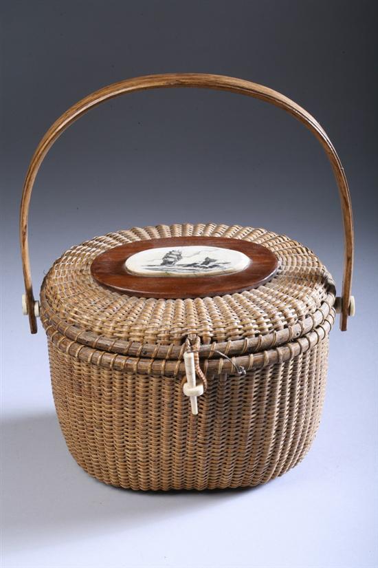 Appraisal: NANTUCKET LIGHTSHIP BASKET Circa Oval with swing handle The hinged