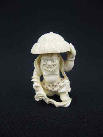 Appraisal: Carved Ivory Netsuke of a Man with Hat signed ''