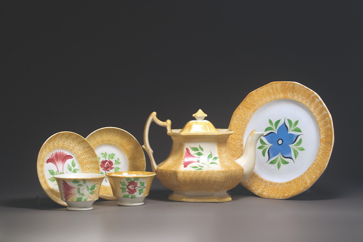 Appraisal: FOUR STAFFORDSHIRE YELLOW SPATTERWARE TEAWARES CIRCA Comprising a 'Thistle' pattern