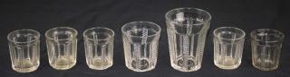 Appraisal: seven pattern molded tumblers including rare oversized example clear cable