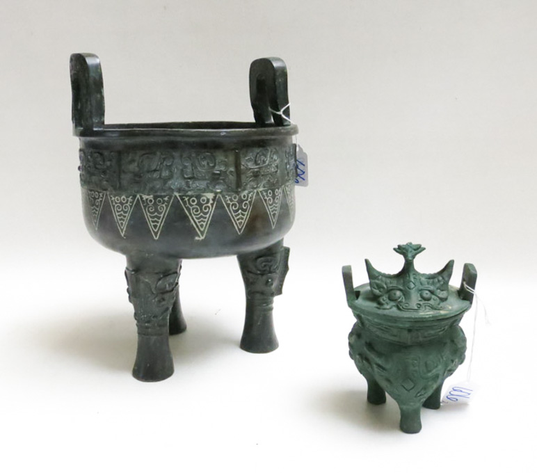 Appraisal: TWO CHINESE BRONZE TRI-FOOTED VESSELS the larger a raised bowl