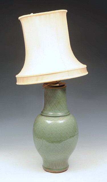 Appraisal: AN TH CENTURY CHINESE CELADON POTTERY VASE with stylised decoration