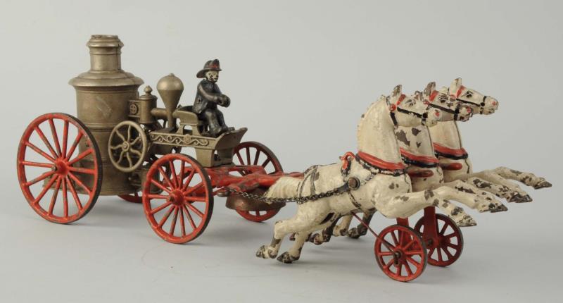 Appraisal: Cast Iron Horse Drawn Fire Pumper Toy American made Original