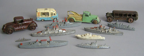 Appraisal: Eight Tootsie toy naval vessels together with a tow truck