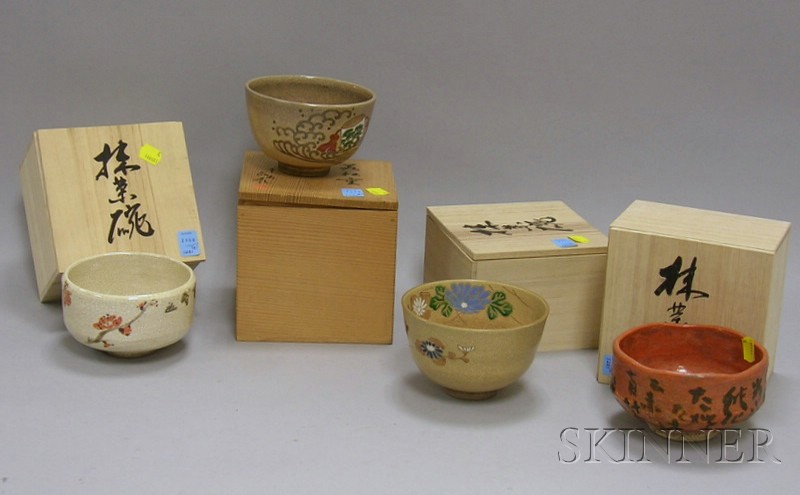 Appraisal: Four Asian Decorated Pottery Tea Ceremony Bowls in Original Wooden