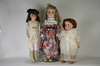 Appraisal: DOLL - Lot of three A M dolls including a