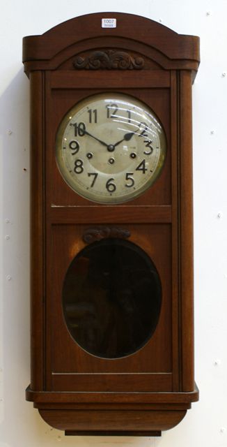 Appraisal: A German early th century walnut wall clock key and