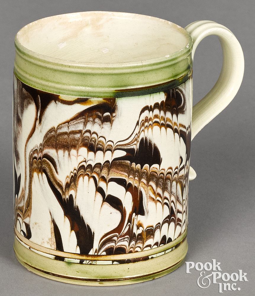 Appraisal: Small mocha mug with marbleized glaze Small mocha mug with