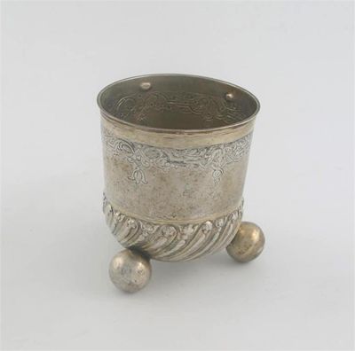 Appraisal: An early th century German parcel-gilt beaker on three large