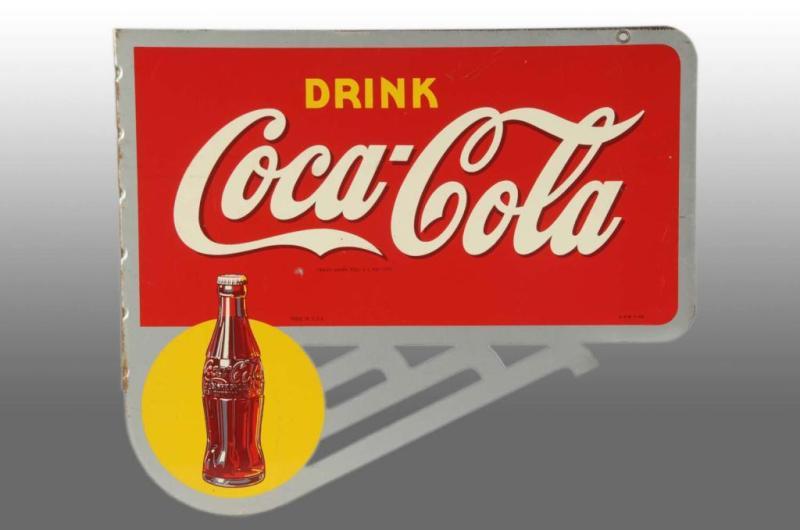 Appraisal: Heavy Tin Coca-Cola Flange Sign Description One minor bend on