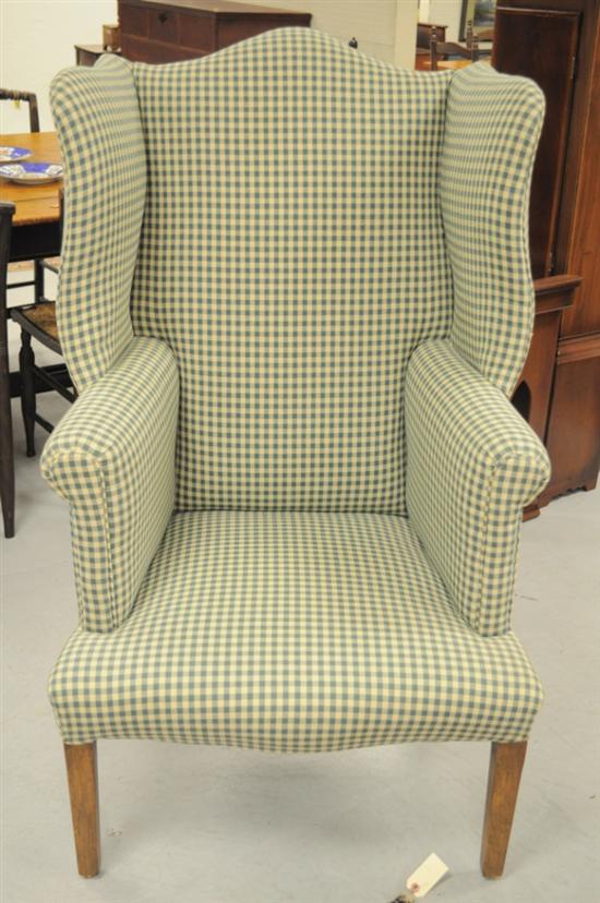 Appraisal: Wing chair straight tapered legs green gingham upholstery