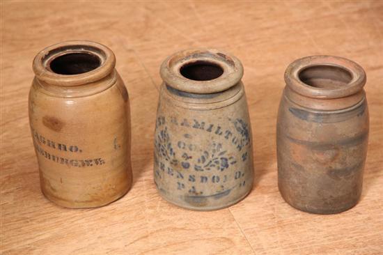 Appraisal: THREE STONEWARE CROCKS Layered and collared rim with illegible cobalt