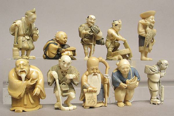 Appraisal: A group of ten small tinted ivory figural netsuke Including