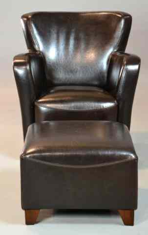 Appraisal: A Chocolate Brown Leather Club Chair Matching OtSleek contemporary design