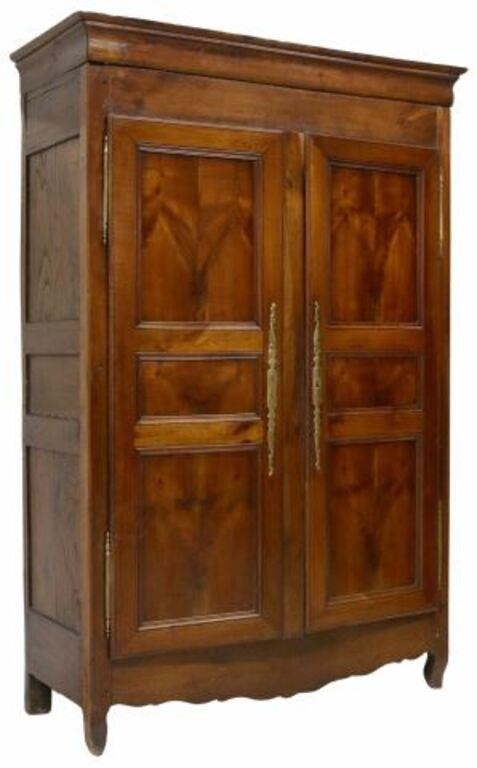 Appraisal: French Provincial mixed wood armoire th c molded cornice two