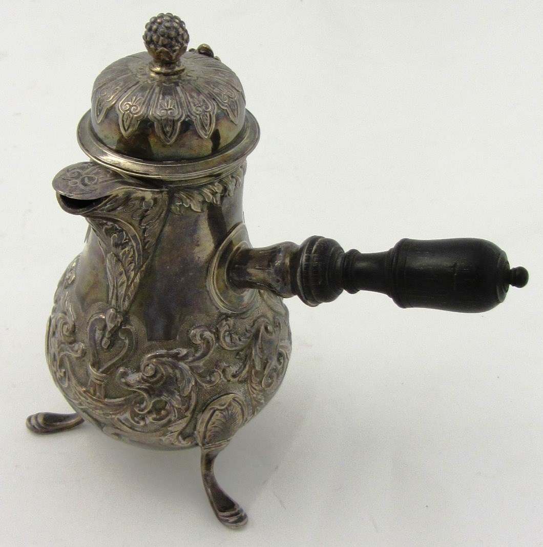 Appraisal: A French baluster shaped small hinge lidded coffee jug with