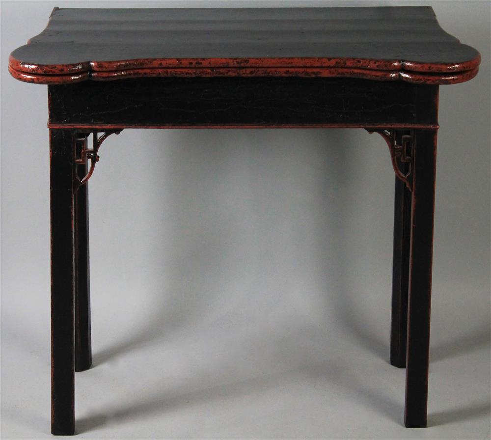 Appraisal: CHIPPENDALE STYLE BLACK PAINTED FLIP TOP GAMES TABLE having a