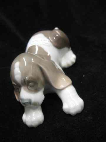 Appraisal: Lladro Porcelain Figurine of a Beagle Puppy retired '' tall