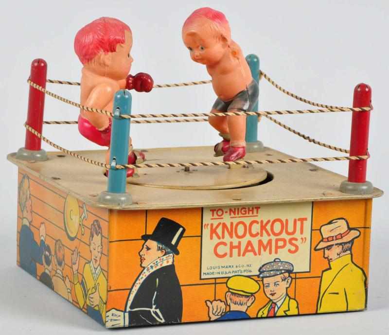 Appraisal: Tin Litho Marx Knockout Champs Wind-Up Toy Description American Working