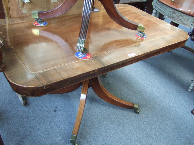 Appraisal: A late Regency mahogany snap top breakfast table the crossbanded