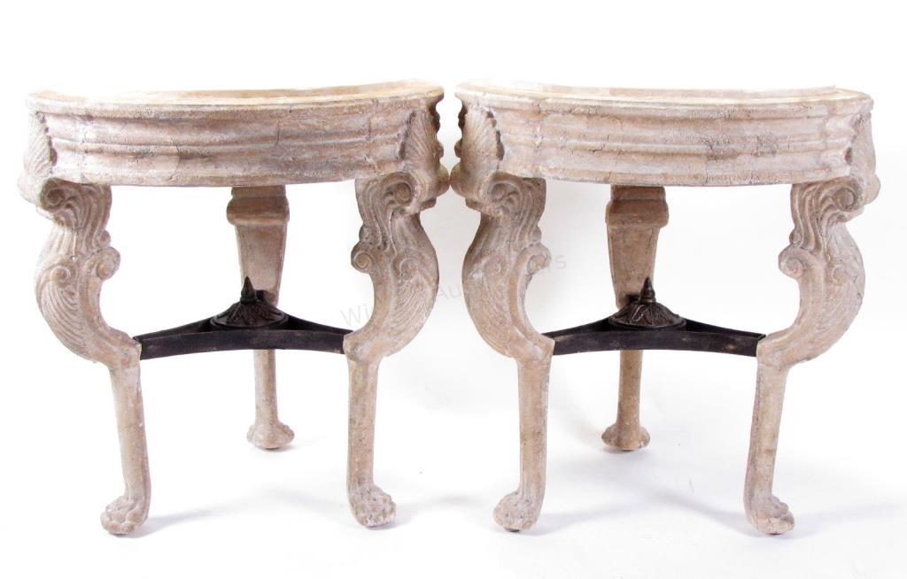 Appraisal: A pair of classical-style composite end tables by Kreiss with