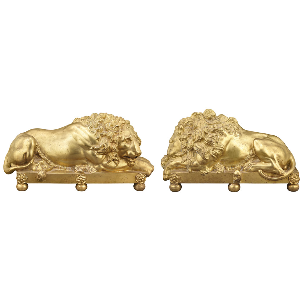 Appraisal: Pair of English Gilt-Bronze Models of Lions After the model