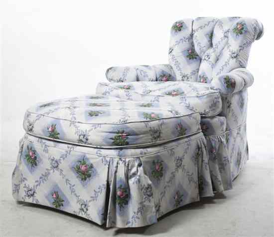 Appraisal: A Contemporary Upholstered Armchair having a button tufted back together