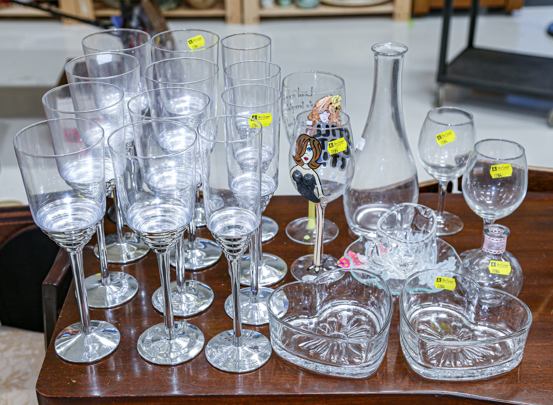 Appraisal: ASSORTMENT OF GLASSWARE Includes metal stemmed glasses in H two