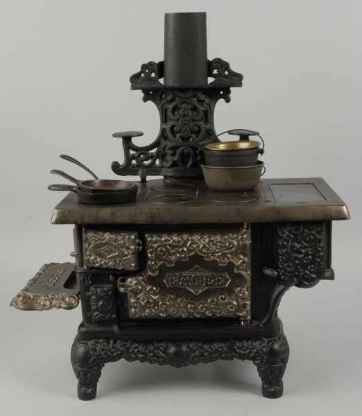 Appraisal: Cast Iron Hubley Eagle Children's Stove Description Includes stovepipe and