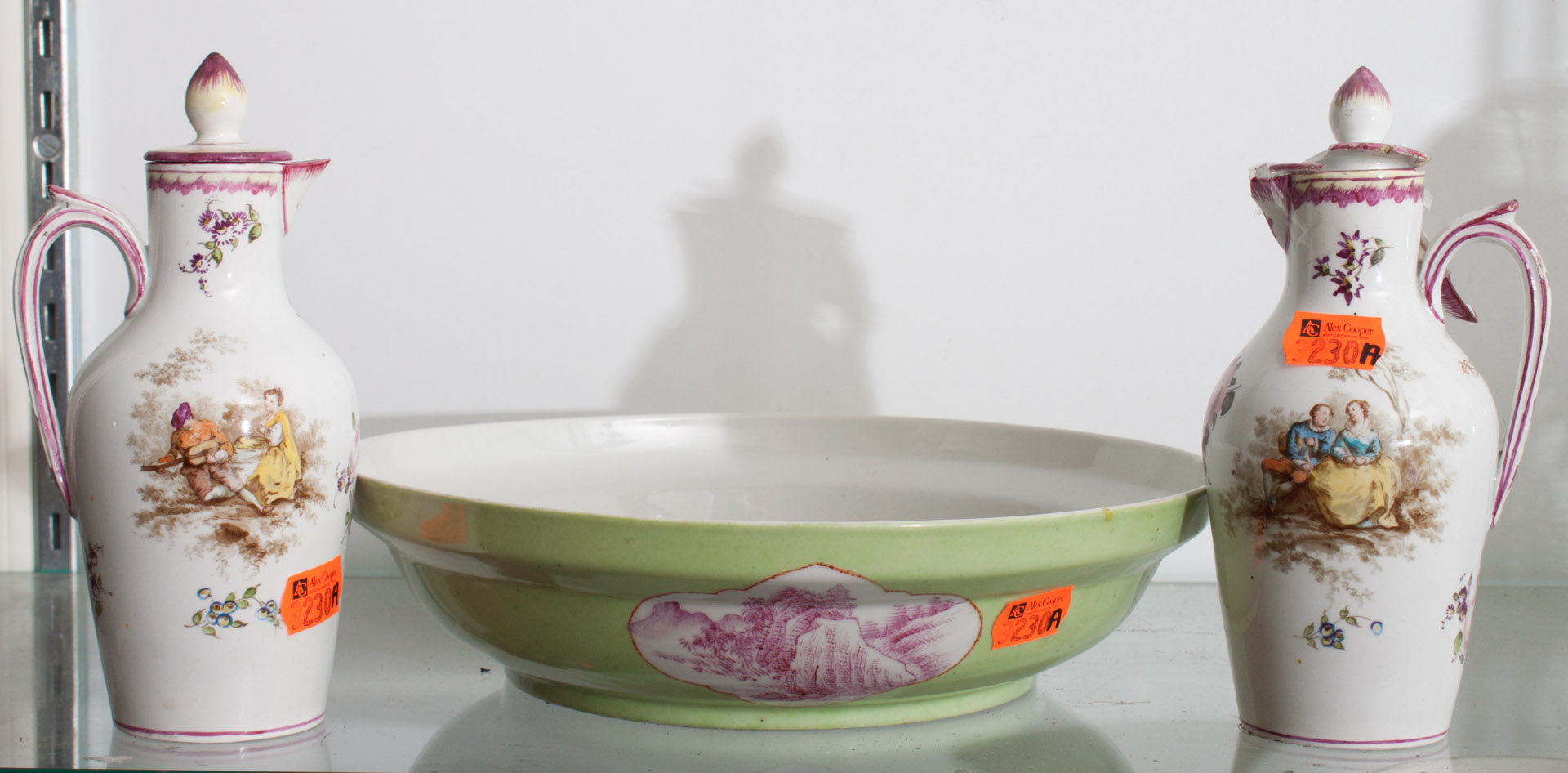 Appraisal: a Pair of soft paste pitchers and an oriental bowl