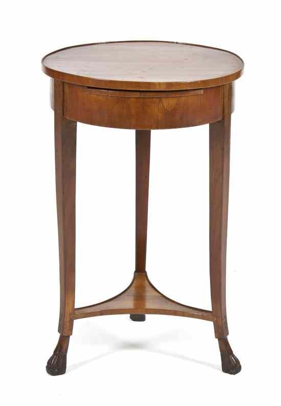 Appraisal: An American Mahogany Occasional Table the circular top over the