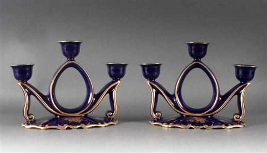 Appraisal: Pair of J L Menau German cobalt porcelain three-light candleholders