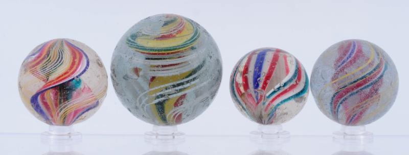 Appraisal: Lot Of Large Swirl Marbles Lot includes a multicolor double