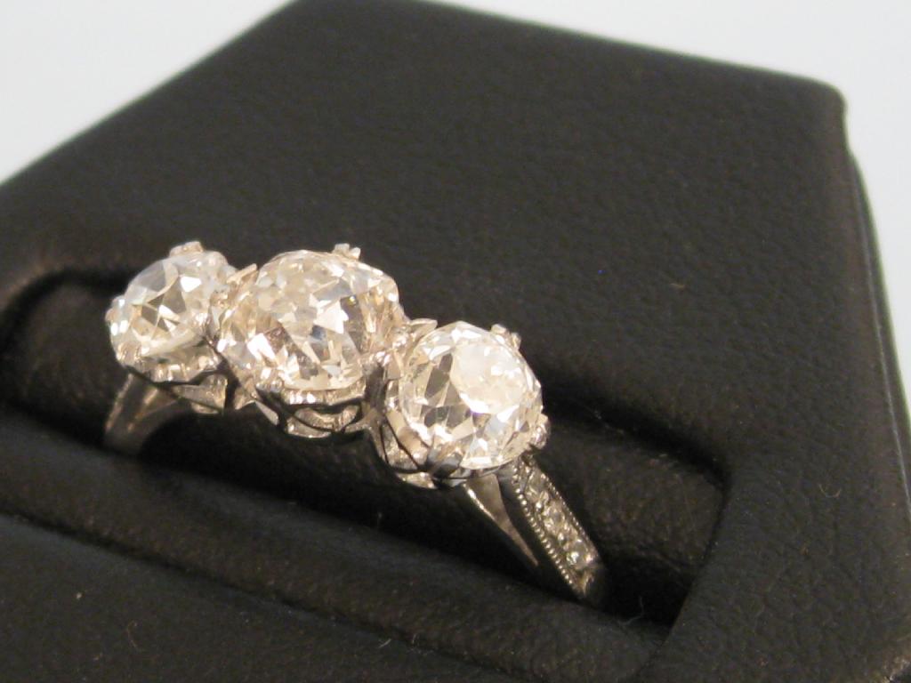 Appraisal: A three stone Diamond Ring the graduated circular-cut stones approx