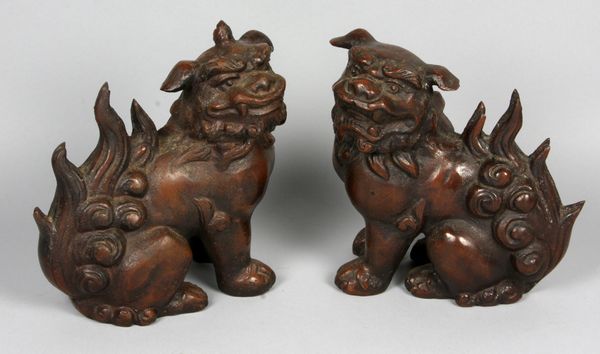 Appraisal: Pair of Chinese bronze Foo dogs h x l Good