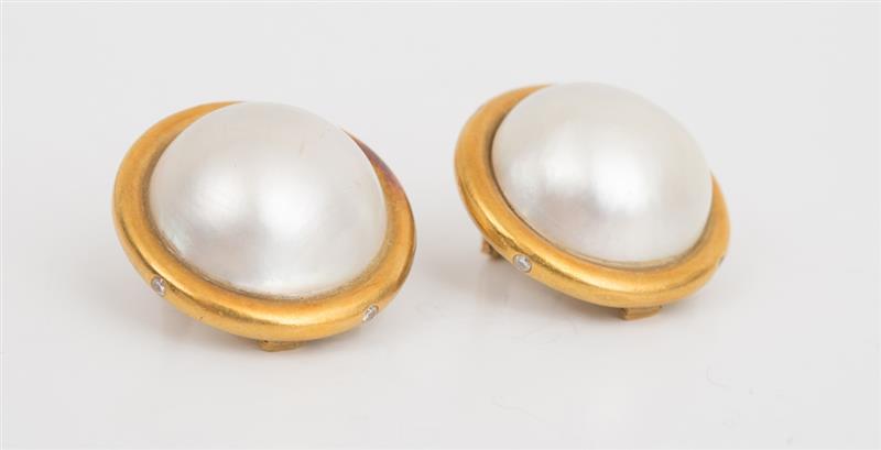 Appraisal: PAIR OF K YELLOW GOLD PEARL AND DIAMOND EARCLIPS Stamped