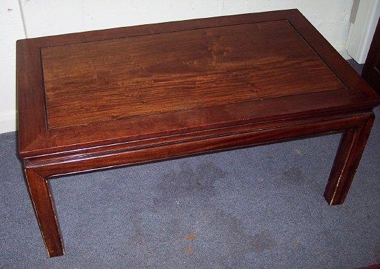 Appraisal: A Chinese rectangular hardwood table raised on square legs cm