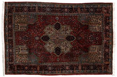 Appraisal: Garden Kerman rug elaborate central medallion on burgundy field corner