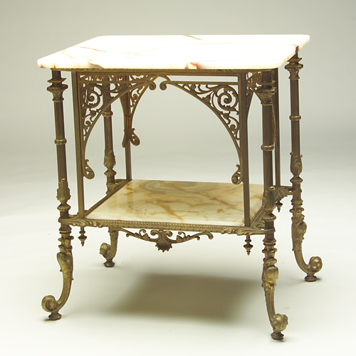 Appraisal: Baroque style bronze and onyx two-tiered table