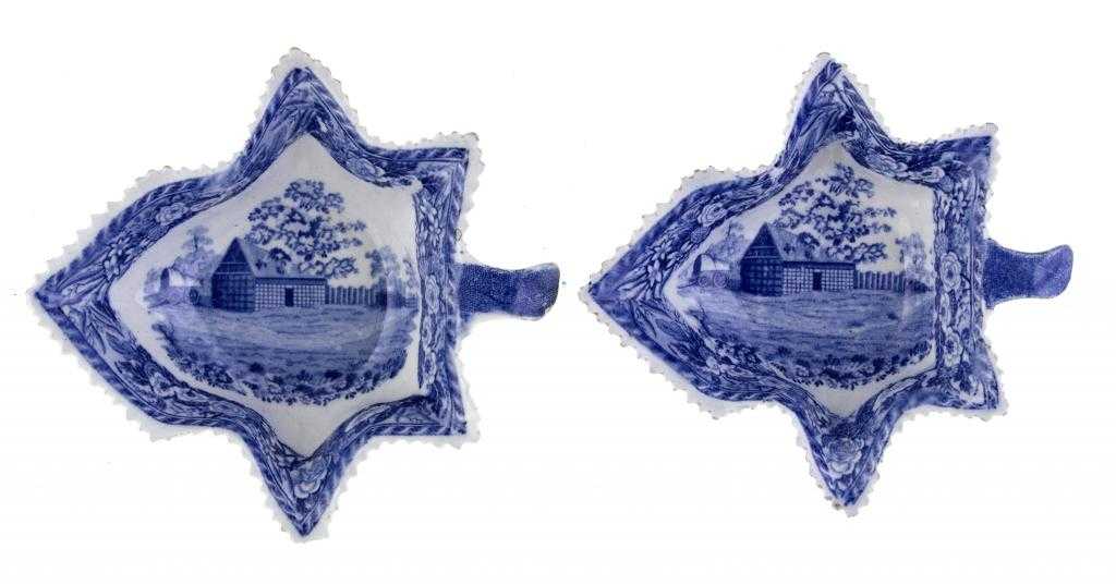 Appraisal: TWO BLUE PRINTED EARTHENWARE MONK'S ROCK SERIES PICKLE DISHES of