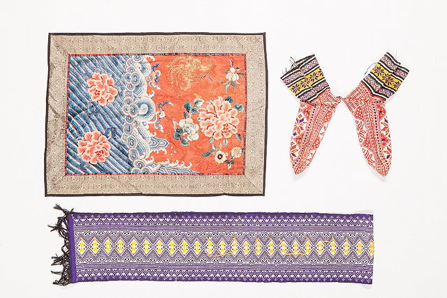 Appraisal: A PAIR OF CENTRAL ASIAN SOCKS with multi-colour decoration a