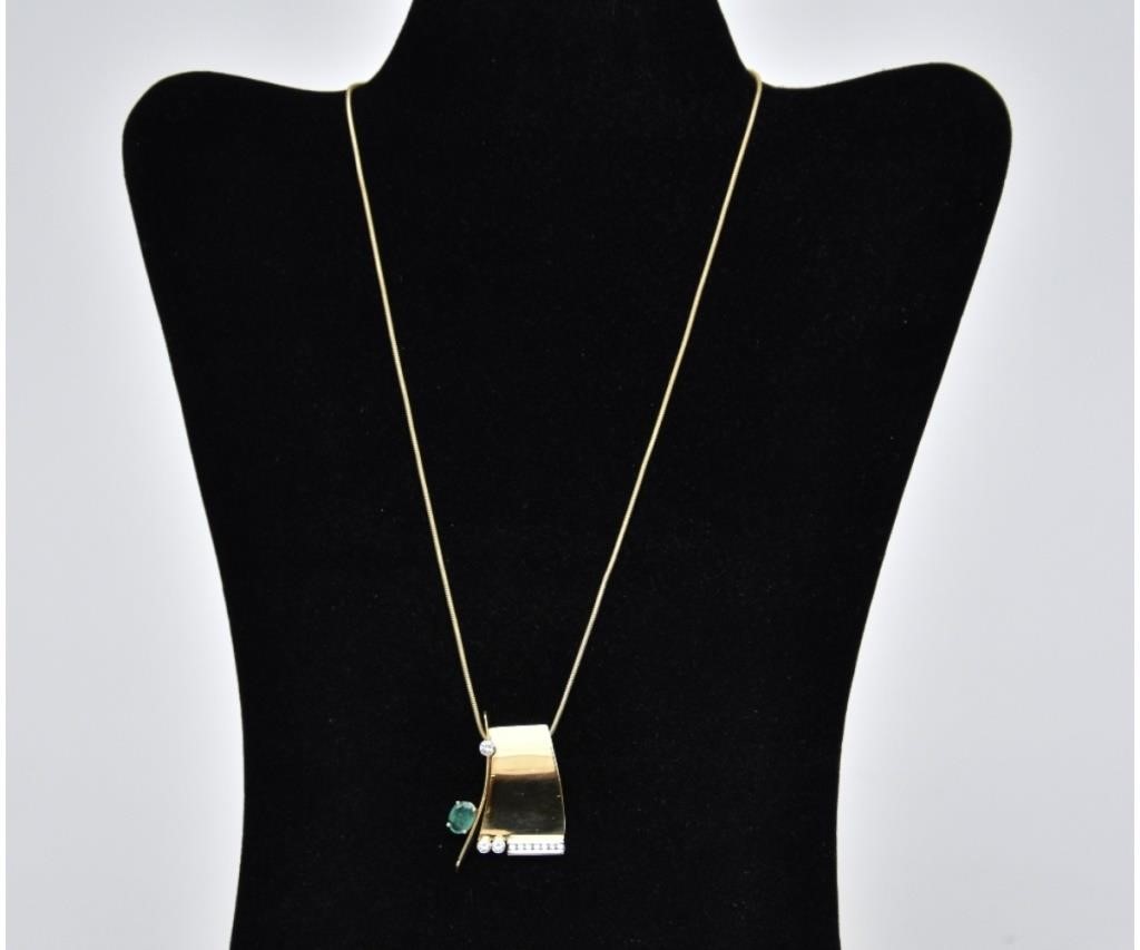 Appraisal: K gold pendant with natural emerald mm x mm x