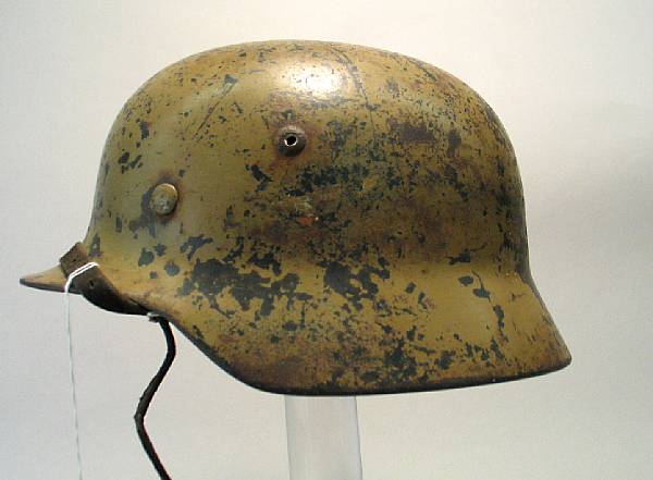 Appraisal: A German Model Luftwaffe helmet The helmet with what appears