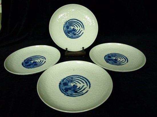 Appraisal: Four Japanese plates painted a central roundel of a bird